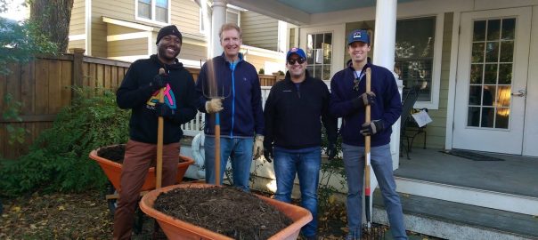 Corporate volunteers do landscaping